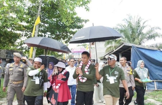 
					Bupati Kampar Buka Festival Pacu Sampan Kepala Naga di Desa Teratak Buluh