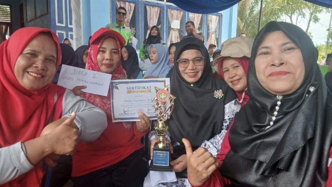 
					Etika Yuslaini Guru UPT SDN 001 Binamang Berhasil Raih Prestasi Gemilang