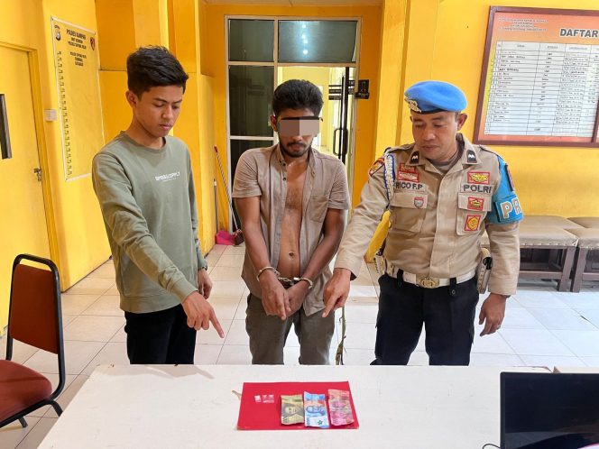 
					Polsek Tapung Hilir Tangkap Pelaku Narkoba di Perkebunan Sawit PT Sekar Bumi Alam Lestari