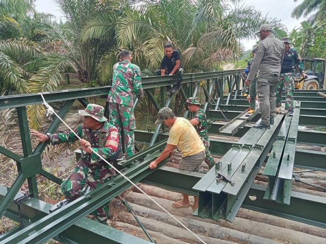 
					Jembatan Sungai Silimutan Rampung, TNI AD Buka Akses Warga Simalungun